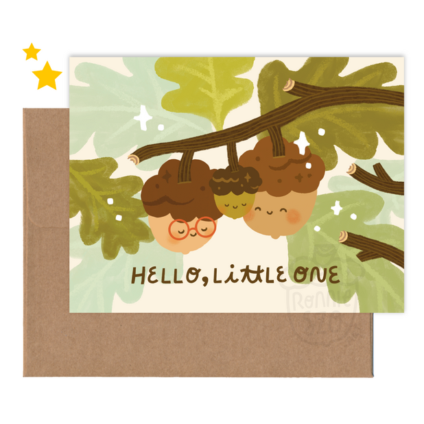 Greeting card design showing a little acorn family